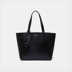 A minimalist black leather tote bag displayed against a plain background. The tote features a smooth leather texture and a clean, structured design with no external embellishments, showcasing its simplicity and elegance. It has two sturdy leather handles and a spacious interior, making it a practical choice for everyday use. The neutral tan color adds to the bag’s versatile appeal, perfect for complementing various outfits and occasions.