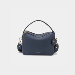 A marineblue-colored upgraded double zip leather bag displayed from a front angle against a plain background. The bag showcases a minimalist design with pebbled leather and two prominent zippered compartments. The structured form and gold-tone zippers add both functionality and a sleek, modern touch. The neutral marine blue color enhances the bag's versatile appeal, making it suitable for a variety of outfits and occasions.