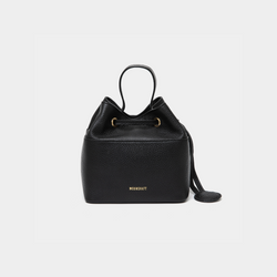 Black-colored pebbled leather bucket bag with gold accents, featuring a drawstring closure and a compact design. The MOONSHAFT logo is embossed in gold at the bottom front. A small round leather accessory is attached to the side for added detail.