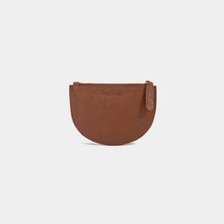 A cognac Half Moon Coin Purse made of goat leather with a zipper on the top and an embossed MOONSHAFT logo on the front.